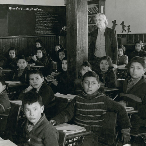 Students and a teacher at the All Saints Indian Residential School.