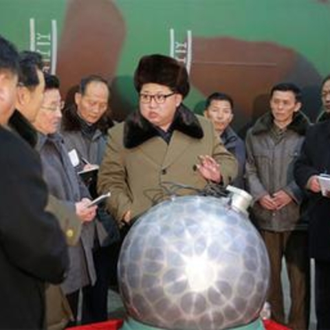 A North Korean image of Kim Jong-un supposedly with a miniaturized nuclear bomb.
