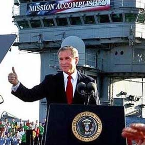 President George W. Bush gives the thumbs-up during his infamous "Mission Accomplished Speech" on May 1, 2003
