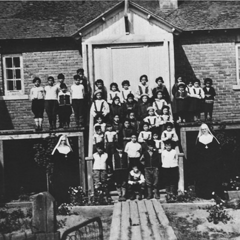 Children and nuns around 1950 at an Indian Residential School in Quebec.