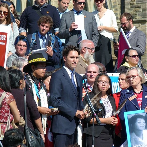 Canadian Prime Minister Justin Trudeau speaking in front of Parliament.