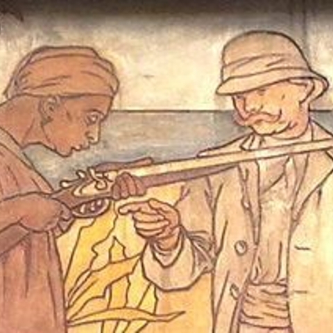 This detail from an early-20th-century image over the entrance to an arms factory in Belgium depicts a European arms manufacturer selling a gun to a darker-skinned purchaser in an exotic setting.