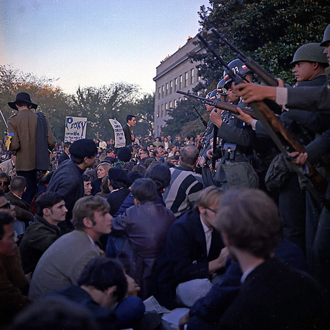 Protesters hold a sit-in at an entrance to the Pentagon in October 1967.