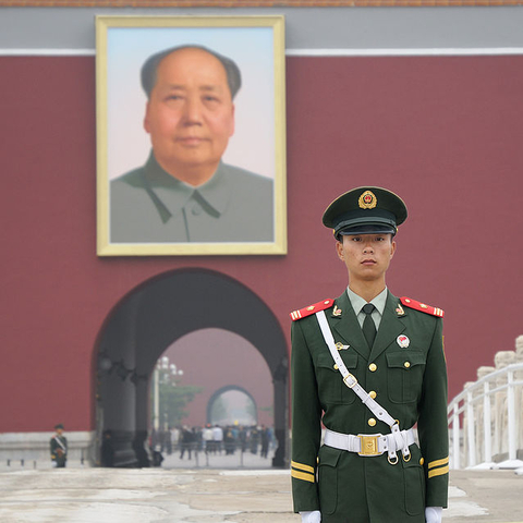 Policeman guarding the southern entrance of the Forbidden City in Beijing.