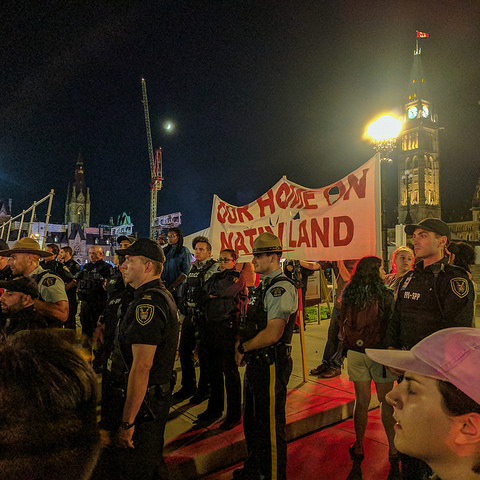 Demonstrators in Ottawa during 150th anniversary celebrations.
