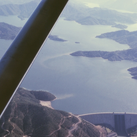 A photo of Shasta Lake and Shasta Dam in 1965.