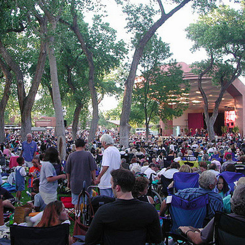 Thousands attend a music festival at the Albuquerque BioPark Zoo.