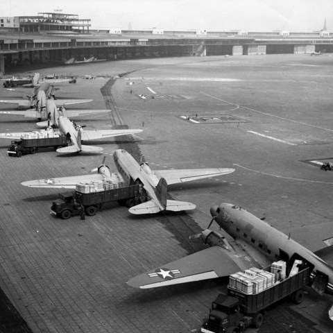 Seven C-47 Skytrains wait to unload in Berlin.