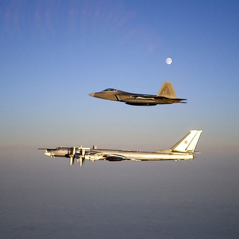 NATO and Russia in close proximity again. A U.S. F-22A Raptor accompanies a Russian Tu-95 near the Alaskan NORAD Region airspace, 2007.