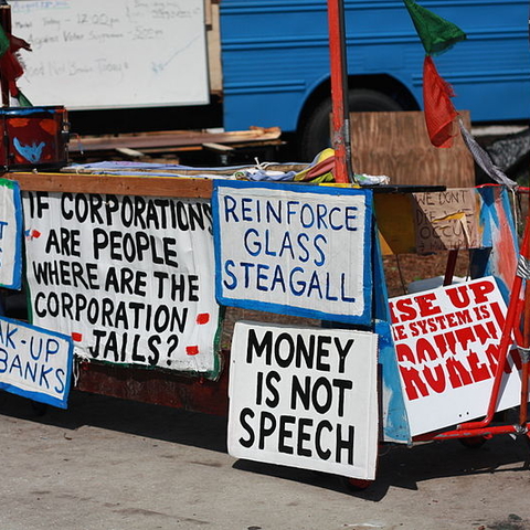 Protestors gather outside of the 2012 National Republican Convention.