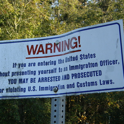 This notice sits on the border between Canada and the United States.