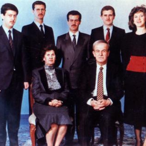 The Assad family around 1994. Bashar, current president of Syria, is second from the left on the back row. Then-president Hafez al-Assad is seated at right.