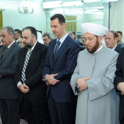 Bashar al-Assad in prayer.