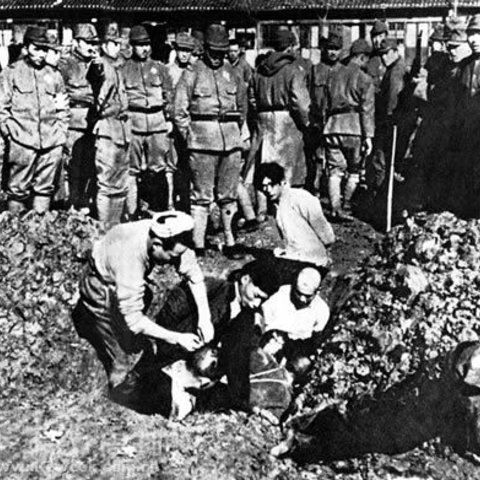 Chinese civilians buried alive during the 1937 Nanking Massacre.