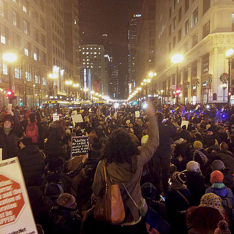 Protestors in Chicago, Illinois rally against Staten Island grand jury's decision in Eric Garner case.