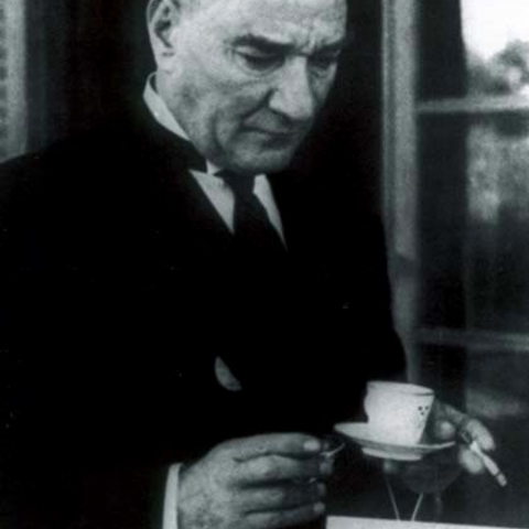 The first President of Turkey during a smoking break.