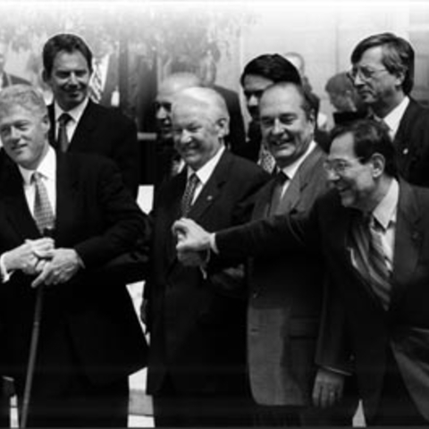 Russian President Boris Yeltsin (center) with NATO Secretary General Javier Solana (right) and U.S. President Bill Clinton.