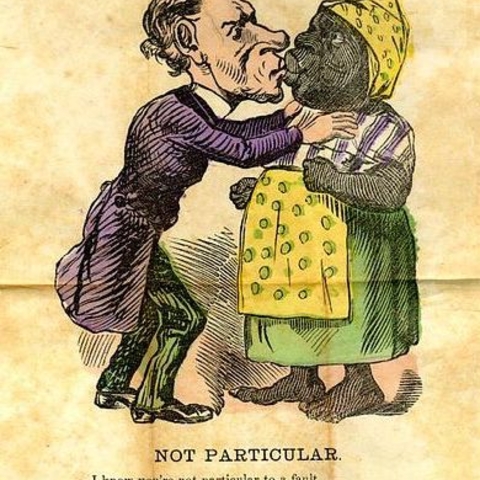 A racist postcard from the early 1900s suggesting that black women were sexually available.