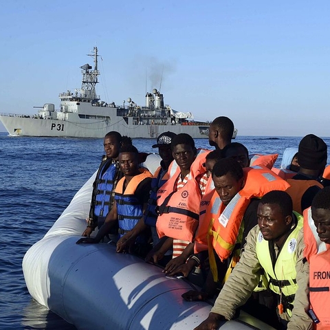 Rescued migrants arriving in Italy.