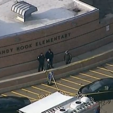 Police arrive at Sandy Hook Elementary after the shooting.
