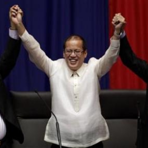 A photograph of Benigno Aquino III.