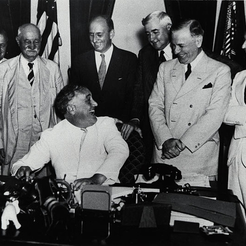 President Franklin Roosevelt surrounded by members of his 'brain trust.'