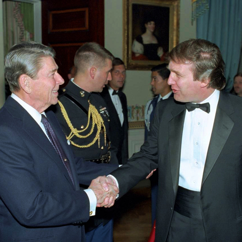 President Ronald Reagan and President Donald Trump greeting one another.