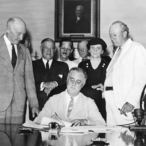 FDR signs the Social Security Act into law in 1935.