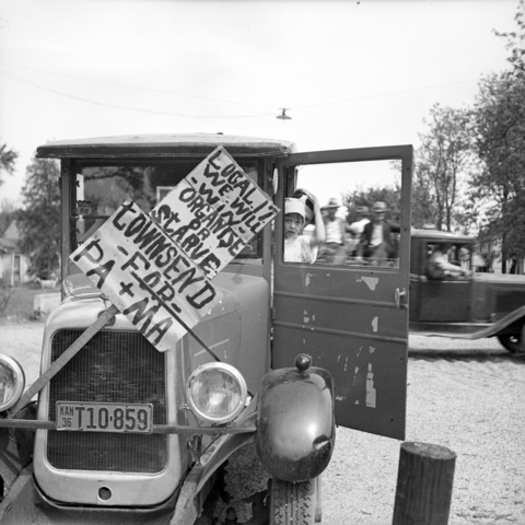 This car in Columbus, Kansas, supported the Townsend plan.