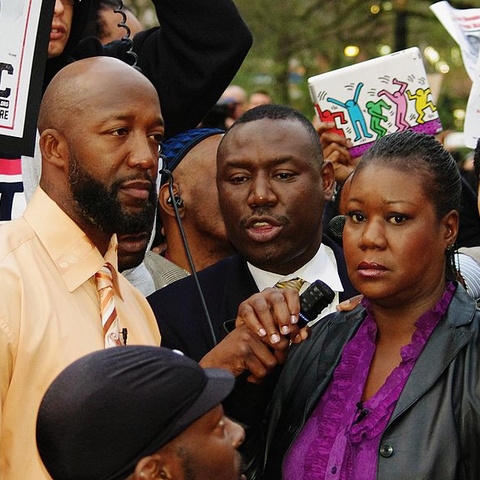 Trayvon's father Tracy Martin, family attorney Benjamin Crump and mother Sybrina Fulton.