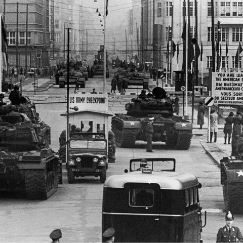 Soviet and American tanks face each other at Checkpoint Charlie.