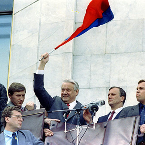 Boris Yeltsin with the Russian flag.