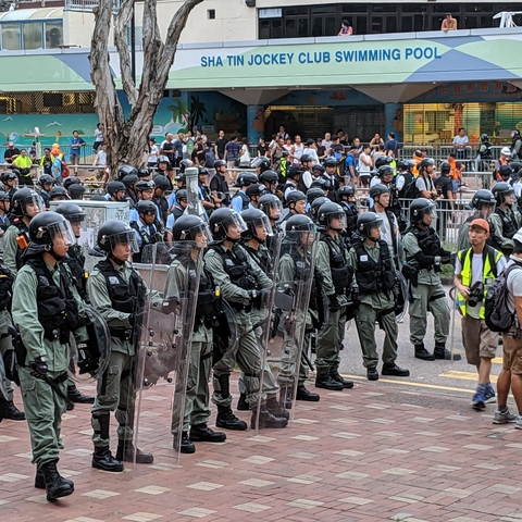 Police gathered near an upscale mall in Sha Tin, Hong Kong, to control protesters.