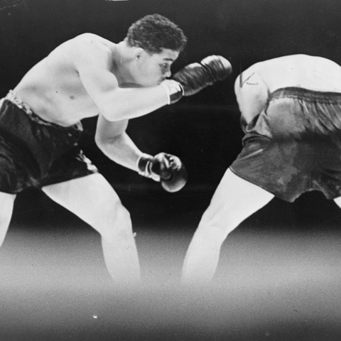 American Joe Louis fights German Max Schmeling.