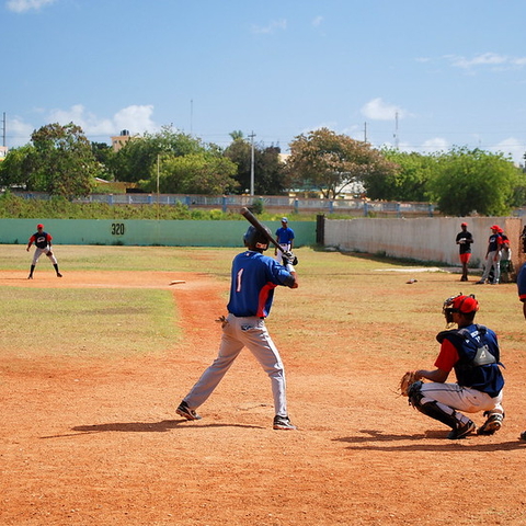 Dominican young men play for their local baseball schools.