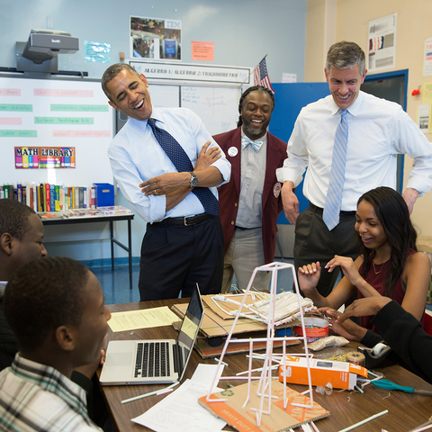 President Barack Obama and Education Secretary Arne Duncan visit a classroom.