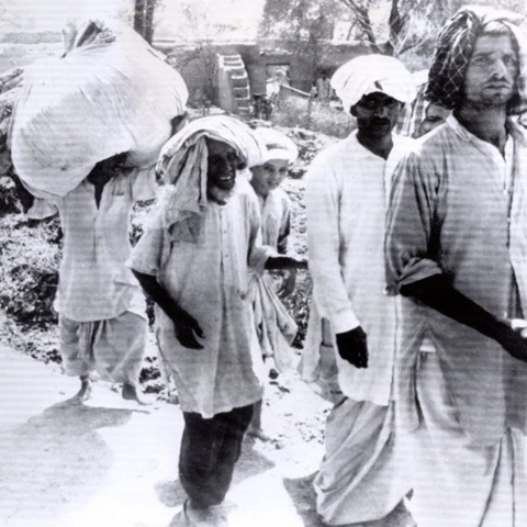 Pakistani refugees leaving their village near Saraghoda.