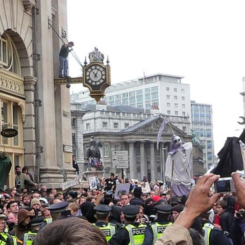 Protestors gather outside of the Bank of England.