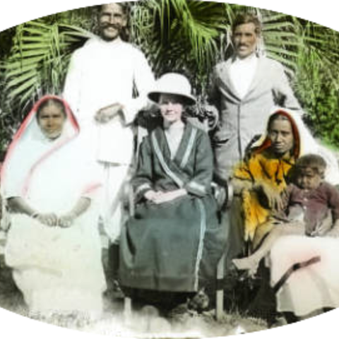 Hope Lee, a missionary from the U.K., sits with Indians in 1915 near Orissa, India.