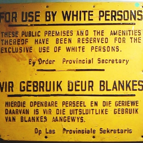 An apartheid-era sign in English and Afrikaans.