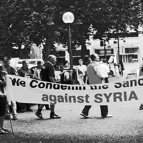 Protesters in Australia in 2011 protest sanctions imposed on Syria.