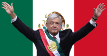 Andrés Manuel López Obrador in front of Mexican flag