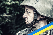 Ukrainian soldier with blue and yellow ribbon overlay